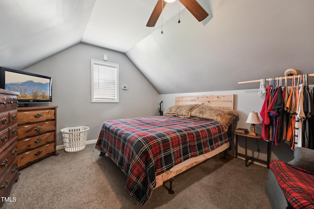 carpeted bedroom featuring ceiling fan, baseboards, and lofted ceiling