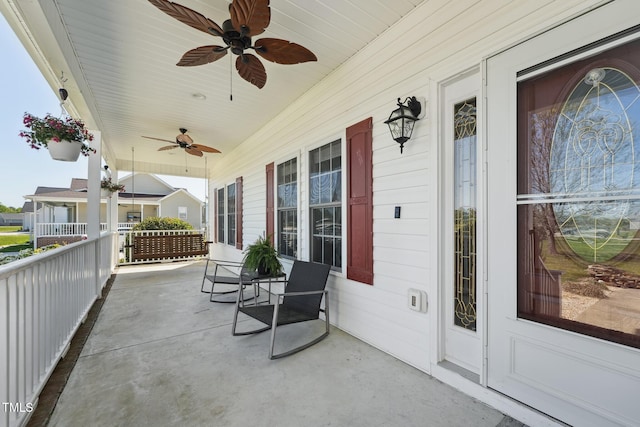 view of patio / terrace featuring a porch and a ceiling fan
