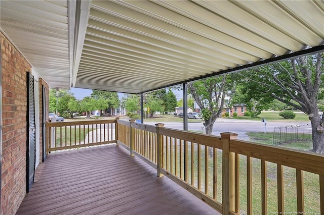 wooden deck featuring covered porch