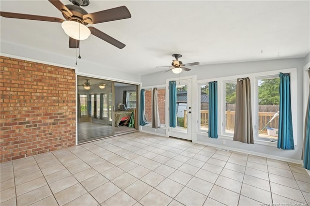 unfurnished sunroom featuring french doors, visible vents, and ceiling fan