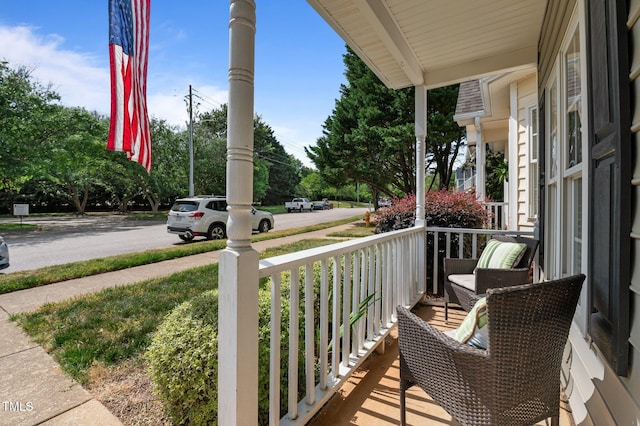 balcony featuring covered porch
