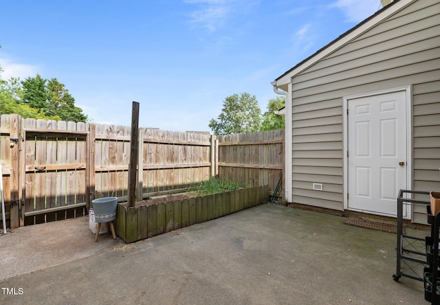 view of patio with fence