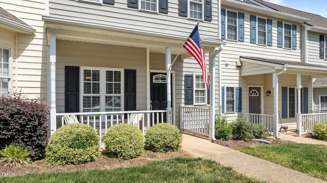 doorway to property featuring a porch