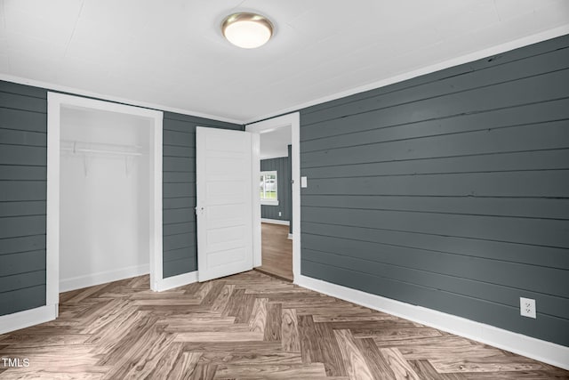 1219 Junction Rd, Durham, NC 27704 - unfurnished bedroom with wooden walls and a closet