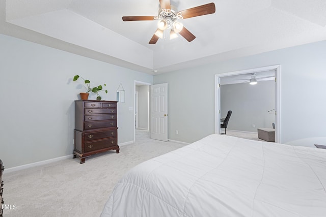 carpeted bedroom with baseboards and ceiling fan