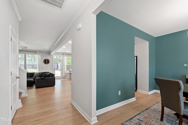303 Forestview Crest Way, Fuquay Varina, NC 27526 - office with crown molding, baseboards, visible vents, and light wood-type flooring