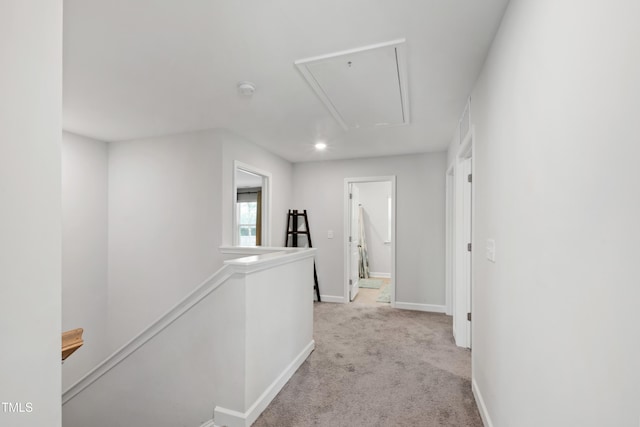 303 Forestview Crest Way, Fuquay Varina, NC 27526 - corridor with carpet floors, visible vents, baseboards, attic access, and an upstairs landing