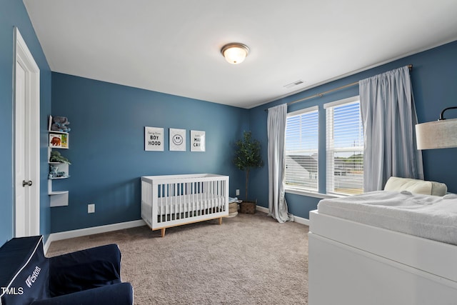 303 Forestview Crest Way, Fuquay Varina, NC 27526 - bedroom with visible vents, carpet flooring, and baseboards