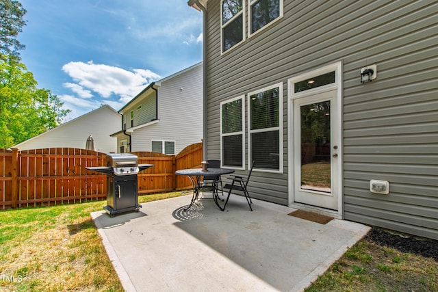 303 Forestview Crest Way, Fuquay Varina, NC 27526 - view of patio featuring fence, outdoor dining space, and area for grilling