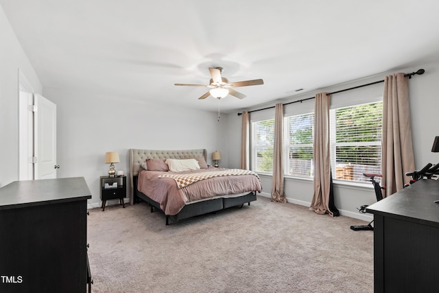 303 Forestview Crest Way, Fuquay Varina, NC 27526 - bedroom featuring visible vents, a ceiling fan, baseboards, and light carpet