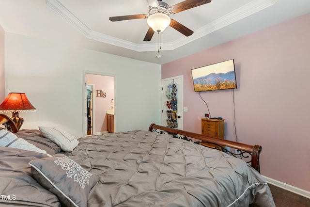 106 Churment Ct, Durham, NC 27703 - bedroom featuring wood finished floors, ensuite bathroom, a raised ceiling, baseboards, and ornamental molding