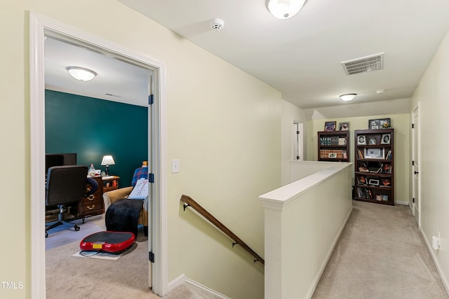 106 Churment Ct, Durham, NC 27703 - corridor featuring baseboards, visible vents, an upstairs landing, and light colored carpet