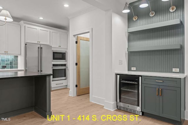 kitchen with wine cooler, open shelves, stainless steel appliances, and light wood finished floors