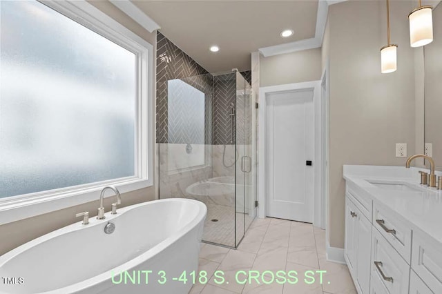 bathroom with vanity, marble finish floor, a freestanding tub, recessed lighting, and a stall shower