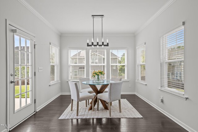 sunroom featuring a chandelier