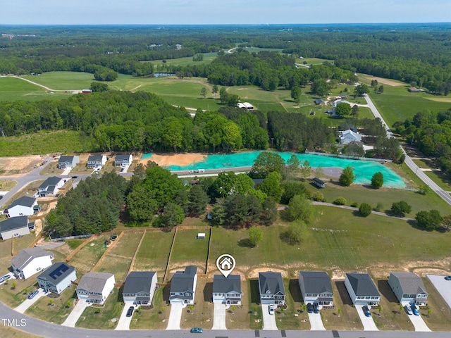 aerial view featuring a view of trees