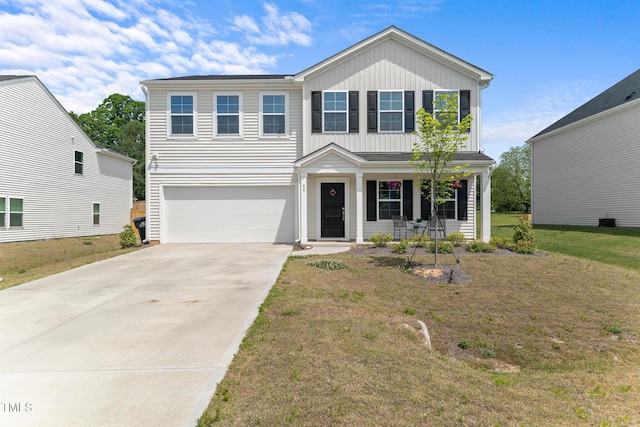 traditional-style home featuring board and batten siding, concrete driveway, a front yard, an attached garage, and a porch