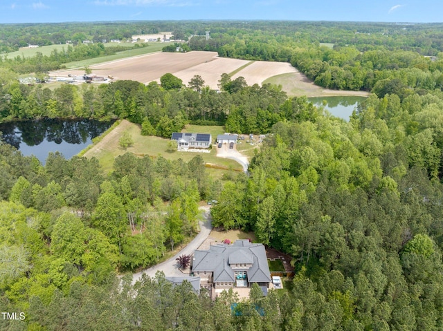 120 Wood Lake Dr, Fuquay Varina, NC 27526 - birds eye view of property featuring a wooded view and a water view