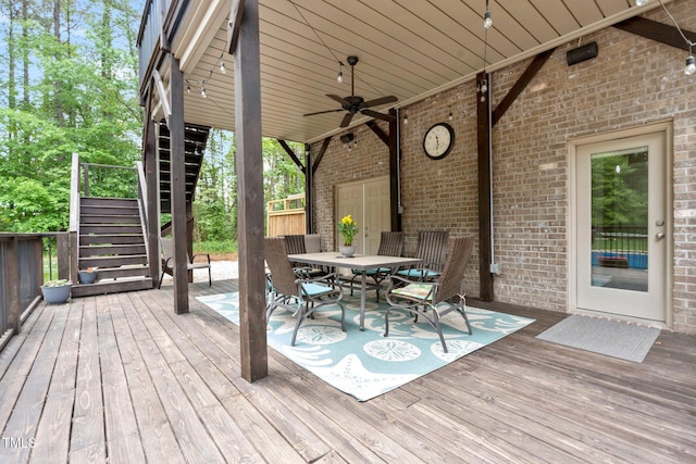 120 Wood Lake Dr, Fuquay Varina, NC 27526 - wooden terrace with stairway, outdoor dining space, and ceiling fan