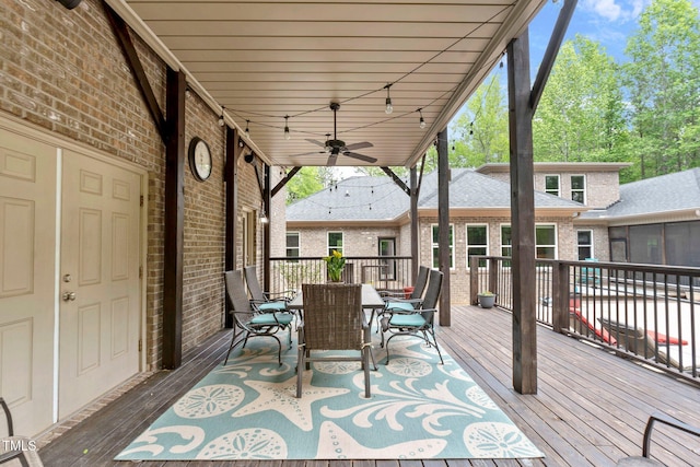 120 Wood Lake Dr, Fuquay Varina, NC 27526 - deck featuring ceiling fan, a sunroom, and outdoor dining area