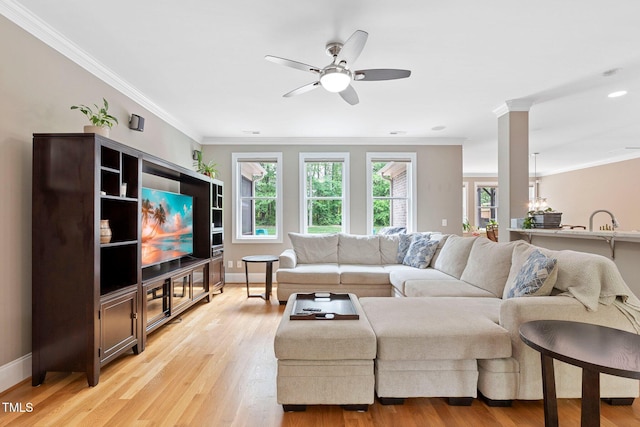 120 Wood Lake Dr, Fuquay Varina, NC 27526 - living area featuring a ceiling fan, baseboards, ornamental molding, and light wood-style flooring
