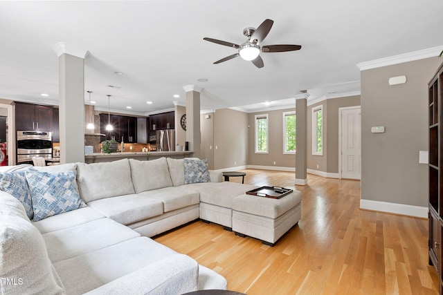 120 Wood Lake Dr, Fuquay Varina, NC 27526 - living room with recessed lighting, light wood-type flooring, a ceiling fan, baseboards, and ornamental molding