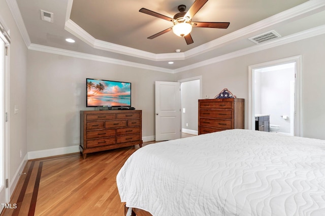 120 Wood Lake Dr, Fuquay Varina, NC 27526 - bedroom with a tray ceiling, light wood-type flooring, visible vents, and ornamental molding