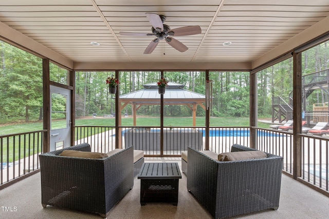 120 Wood Lake Dr, Fuquay Varina, NC 27526 - sunroom with outdoor lounge area and a ceiling fan