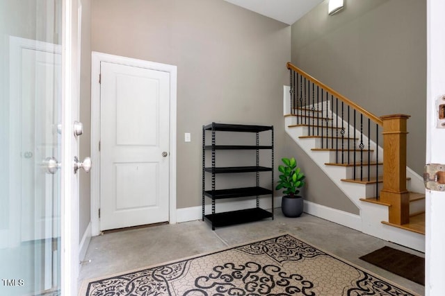 120 Wood Lake Dr, Fuquay Varina, NC 27526 - stairway with baseboards and unfinished concrete flooring