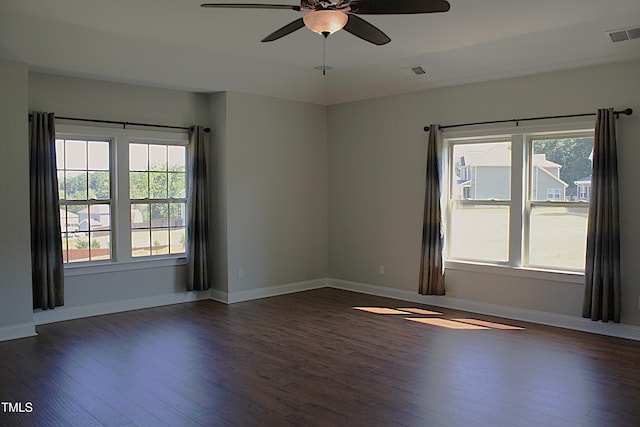 5004 Clowser Minnow Ct, Wake Forest, NC 27587 - empty room with dark wood-type flooring, ceiling fan, and plenty of natural light