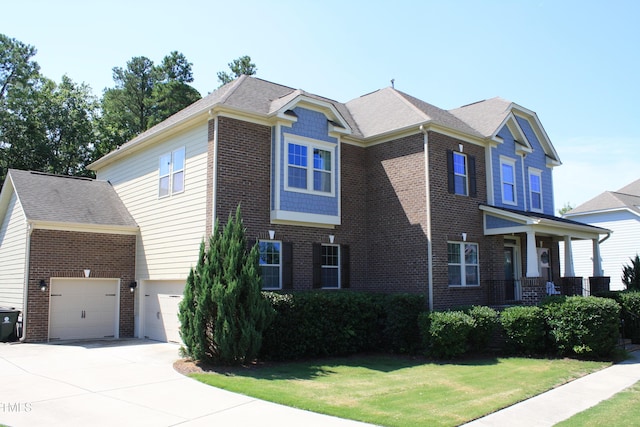 5004 Clowser Minnow Ct, Wake Forest, NC 27587 - view of side of property featuring driveway, a yard, a garage, and brick siding