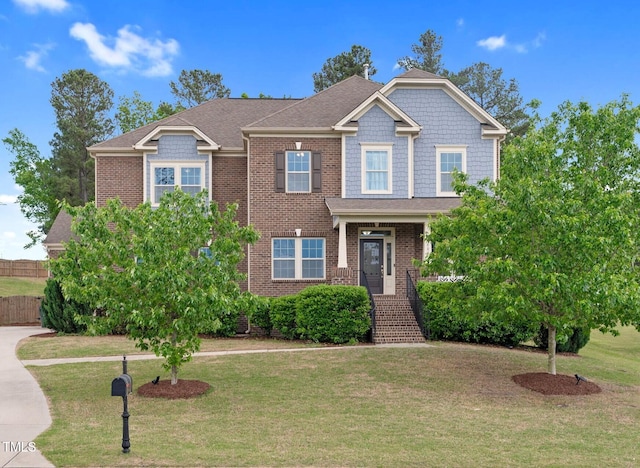 5004 Clowser Minnow Ct, Wake Forest, NC 27587 - view of front facade with roof with shingles and brick siding