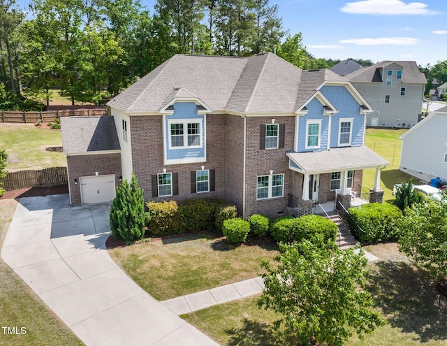 5004 Clowser Minnow Ct, Wake Forest, NC 27587 - view of front of house featuring concrete driveway, brick siding, a garage, and a residential view