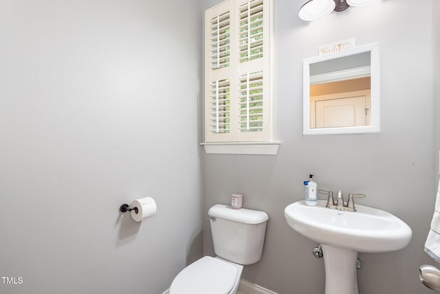 1209 Shasta Daisy Dr, Wake Forest, NC 27587 - bathroom with toilet and baseboards