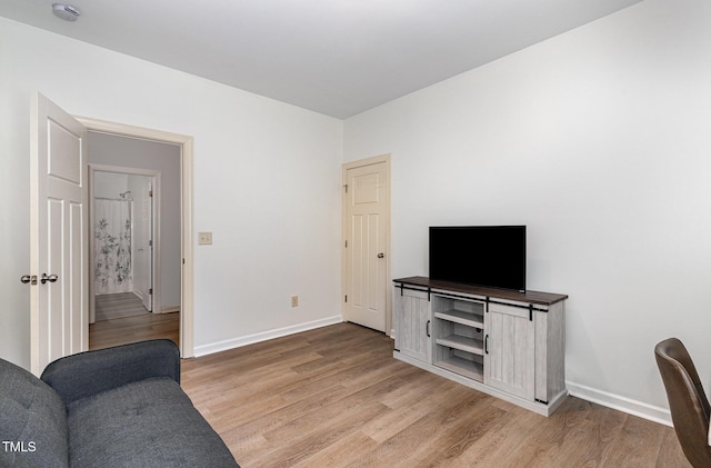 1209 Shasta Daisy Dr, Wake Forest, NC 27587 - living area featuring light wood-style floors and baseboards