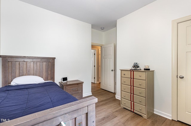 1209 Shasta Daisy Dr, Wake Forest, NC 27587 - bedroom with light wood-type flooring and baseboards