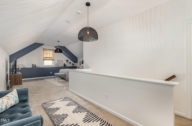 1209 Shasta Daisy Dr, Wake Forest, NC 27587 - living area featuring light carpet, lofted ceiling, and baseboards