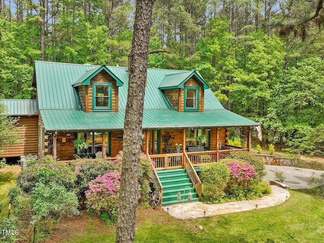 3009 Pleasant Hill Church Rd, Siler City, NC 27344 - back of house with a porch, stairs, log siding, and metal roof