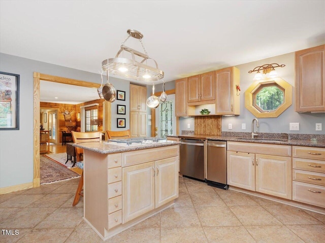 3009 Pleasant Hill Church Rd, Siler City, NC 27344 - kitchen featuring a sink, stainless steel dishwasher, light brown cabinetry, light stone counters, and a kitchen island
