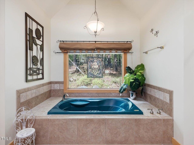 3009 Pleasant Hill Church Rd, Siler City, NC 27344 - bathroom featuring vaulted ceiling and a garden tub