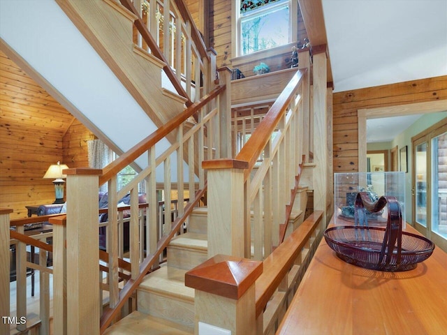 3009 Pleasant Hill Church Rd, Siler City, NC 27344 - staircase with wooden walls and high vaulted ceiling