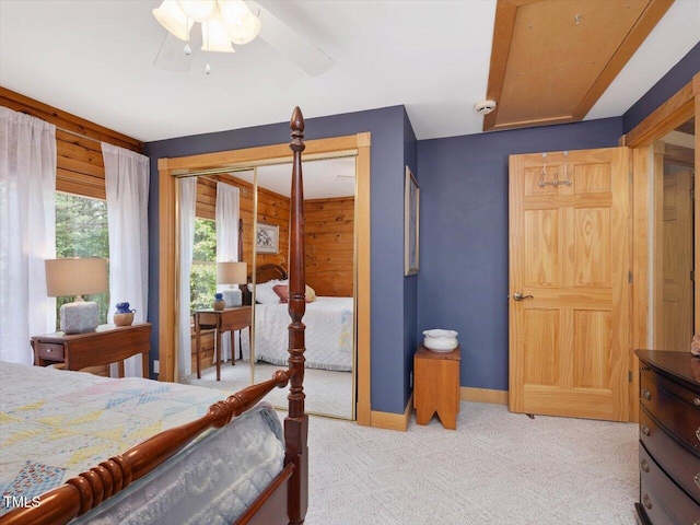 3009 Pleasant Hill Church Rd, Siler City, NC 27344 - bedroom featuring light carpet, wooden walls, and baseboards