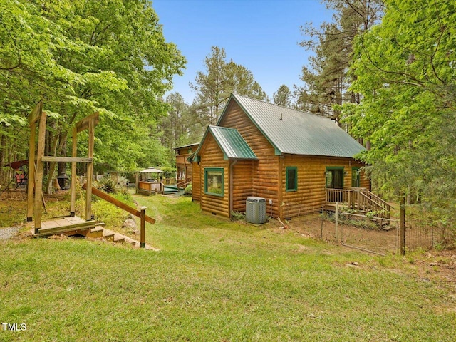 3009 Pleasant Hill Church Rd, Siler City, NC 27344 - view of side of home with cooling unit, faux log siding, and metal roof