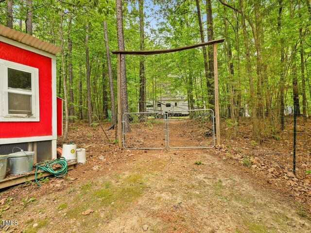 3009 Pleasant Hill Church Rd, Siler City, NC 27344 - view of yard with a gate
