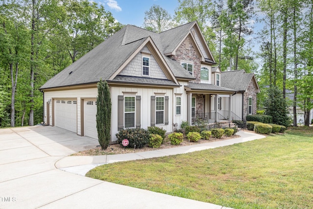 1710 Eddy Ct, Franklinton, NC 27525 - craftsman inspired home with board and batten siding, concrete driveway, a porch, a front yard, and roof with shingles