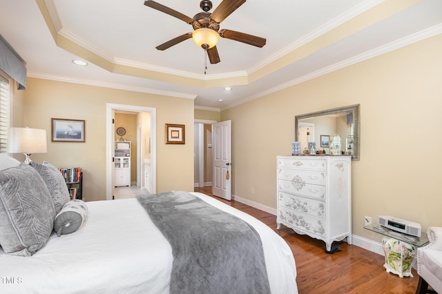 1710 Eddy Ct, Franklinton, NC 27525 - bedroom featuring wood finished floors, a raised ceiling, recessed lighting, baseboards, and crown molding