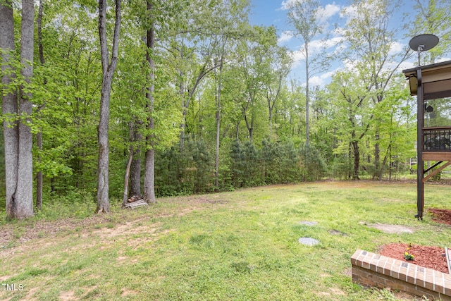 1710 Eddy Ct, Franklinton, NC 27525 - view of green lawn featuring a sunroom