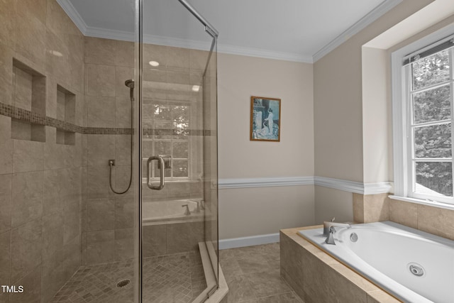 bathroom featuring a stall shower, ornamental molding, a garden tub, and baseboards