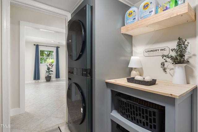 5505 Knollwood Rd, Raleigh, NC 27609 - laundry area with stacked washing machine and dryer and light tile patterned floors