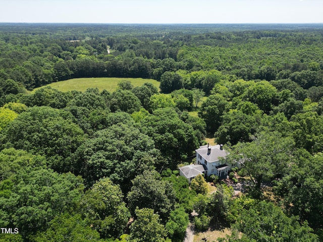 bird's eye view with a view of trees
